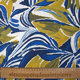 Crepe de viscosa estampado selva anís y fondo blanco azul