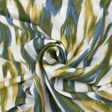 Viscose crepe printed abstract waves green and blue white background