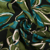 Twill de viscose imprimé nature en peinture turquoise et kaki fond noir