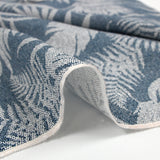 Crepé de viscosa con estampado de follaje puntillismo en azul denim