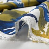 Crepe de viscosa estampado selva anís y fondo blanco azul
