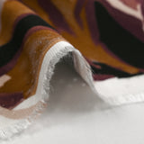 Twill de viscose imprimé nature en peinture vieux rose et ocre fond noir