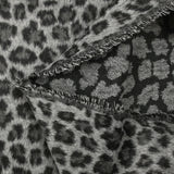 Jacquard de polyester peigné léopard fond gris