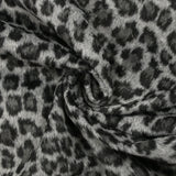 Jacquard de polyester peigné léopard fond gris
