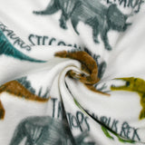 Polaire imprimée dinosaures fond blanc