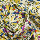 Lin viscose imprimé fleurs de pensées violet et vert fond écru