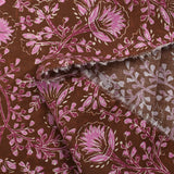 Coton indien imprimé liane de fleurs lilas fond marron