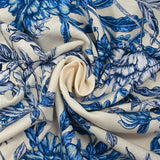 Viscose tissée imprimée fleurs enchantées bleu fond écru