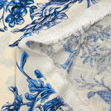 Viscose tissée imprimée fleurs enchantées bleu fond écru