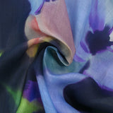 Organdi de coton imprimé fleurs nocturnes fond marine