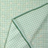Cotton Vichy embroidered pastel green background