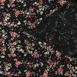 Dentelle imprimée fleurs rouge et jaune fond noir