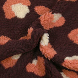 Salmon and ecru leopard faux sherpa fur, dark plum background