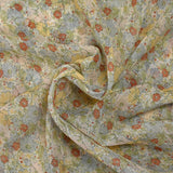 Ribbed chiffon printed with red, blue and yellow flowers on a white background