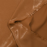 Crêpe de polyester fin pailleté bronze fond camel