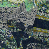 Crinkle chiffon printed with ornamental friezes in sea green and navy background
