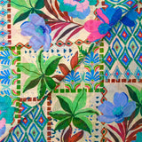 Mousseline crinkle imprimée jardin en fleurs turquoise et ciel fond écru