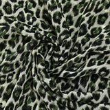 Crinkle chiffon printed with leopard velvet plumetis green white background