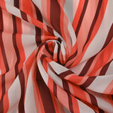 Voile de polyester imprimé rayé corail, blanc cassé et acajou