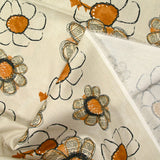 Coton imprimé fleur journal fond beige