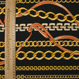 Georgette crepe printed with chain stripes on black background