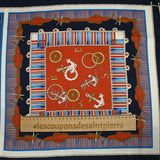 Satin polyester twill printed with red and blue marine knots on a midnight blue background