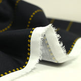 Coton imprimé à pois jaune fond bleu nuit