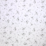Popeline polycoton imprimée splash de fleurs gris fond blanc