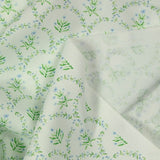 Arco estampado de algodón de fondo blanco de flor roto