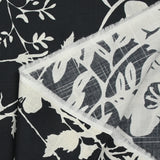 Coton tissé aspect lin imprimé ombre florale fond bleu nuit