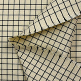 Coton natté à carreaux noir fond écru