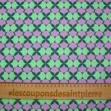 Coated poplin printed with polka dots & purple clover green background