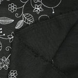 Twill of polyester embroidered soil black background