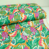 Fondo verde de algodón de estampado rosa y naranja de Ginevra por metro