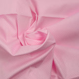 Coton imprimé pois 1mm fond rose layette