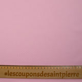 Coton imprimé pois 1mm fond rose layette