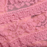 Dentelle polyester à volant mauve