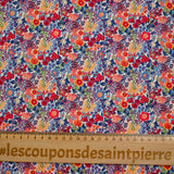 Matilde de algodón Matilde Naranja y flores azules por metro