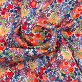 Matilde de algodón Matilde Naranja y flores azules por metro