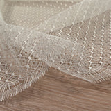 Calais® Eliora white lace broken by the meter
