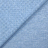 Popeline polycoton imprimée carreaux en pointillisme fond bleu chiné