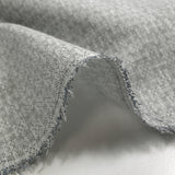 Popeline polycoton imprimée carreaux en pointillisme fond gris chiné