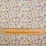 Anna Purple y amarillo Fondo blanco de algodón estampado en blanco por el medidor