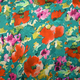Satin de soie imprimé douceur en peinture fond turquoise