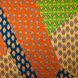 Satin de soie imprimé patchwork cachemire orange, moutarde et bleu