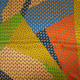Satin de soie imprimé patchwork cachemire orange, moutarde et bleu