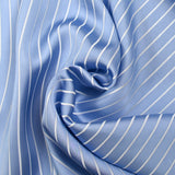 Striped woven-dyed polyviscose satin with sky blue background