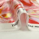 Satin de soie imprimé tulipes sauvages fond rouge corail