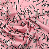 Satin polyester imprimé électrique fond rose