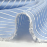 Striped woven-dyed polyviscose satin with sky blue background